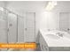 Bright bathroom featuring double sink vanity, glass shower, and modern fixtures at 1278 Langston Ln, Salisbury, NC 28144