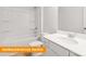 Neutral bathroom featuring tub, toilet and sink with ample counter space at 1278 Langston Ln, Salisbury, NC 28144