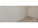Walk-in closet with wire shelving, neutral walls and carpeting at 1278 Langston Ln, Salisbury, NC 28144