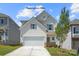 Charming two-story home featuring a two-car garage, tidy landscaping, and a welcoming front entrance at 1278 Langston Ln, Salisbury, NC 28144