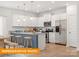 Modern kitchen with stainless steel appliances, an island with seating, and stylish countertops at 1278 Langston Ln, Salisbury, NC 28144