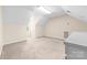 A bonus room has neutral carpet, an unusual ceiling, and an air vent at 13223 Willow Breeze Ln, Huntersville, NC 28078