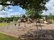Community playground for children with slides, swings, and climbing structures at 13223 Willow Breeze Ln, Huntersville, NC 28078