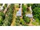 Aerial view of a home on a tree-filled lot with an outbuilding at 1406 High Shoals Rd, Lincolnton, NC 28092