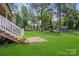 Spacious backyard with a brick patio, perfect for outdoor gatherings and activities at 1406 High Shoals Rd, Lincolnton, NC 28092