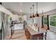 Well-equipped kitchen featuring an island with seating and stainless steel appliances at 1406 High Shoals Rd, Lincolnton, NC 28092