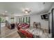 Open-concept living room with modern furnishings and plank flooring at 1406 High Shoals Rd, Lincolnton, NC 28092