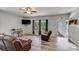 Cozy living room with wood-look flooring and a comfortable seating arrangement at 1406 High Shoals Rd, Lincolnton, NC 28092
