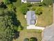 Aerial view of a home with a well-manicured lawn and driveway, showcasing its prime location at 148 Spring Grove Dr, Mooresville, NC 28117