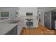 Modern kitchen featuring stainless steel appliances and marble countertops at 148 Spring Grove Dr, Mooresville, NC 28117
