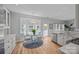 Sunny breakfast nook with bay window, hardwood floors, and backyard view at 148 Spring Grove Dr, Mooresville, NC 28117
