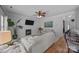 Cozy living room with fireplace, ceiling fan, and hardwood floors at 148 Spring Grove Dr, Mooresville, NC 28117