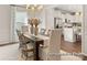 Cozy dining room adjacent to kitchen featuring hardwood floors and natural light at 1509 Autumn Banks Way # 4P, High Shoals, NC 28077