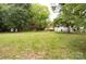 This large, green backyard with a deck provides plenty of space for outdoor enjoyment and activities at 1537 Spangler Dr, Shelby, NC 28150