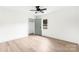 An empty bedroom with sleek floors and a ceiling fan offers a versatile space ready for personalization at 1537 Spangler Dr, Shelby, NC 28150