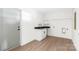 Well-lit laundry room with modern appliances and ample storage space at 1537 Spangler Dr, Shelby, NC 28150