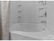 Clean bathroom featuring a well-maintained bathtub with tiled walls and shower at 16930 Summers Walk Blvd, Davidson, NC 28036