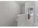 Hallway leading to a bedroom featuring ornate wood furniture at 16930 Summers Walk Blvd, Davidson, NC 28036