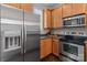 Modern kitchen with stainless steel appliances and plentiful cabinet space at 16930 Summers Walk Blvd, Davidson, NC 28036