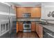 Contemporary kitchen with stainless steel appliances and ample cabinet space at 16930 Summers Walk Blvd, Davidson, NC 28036