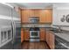 Contemporary kitchen with stainless steel appliances and ample cabinet space at 16930 Summers Walk Blvd, Davidson, NC 28036