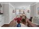 Spacious living room showcasing an open layout with hardwood floors and a view of the dining area at 16930 Summers Walk Blvd, Davidson, NC 28036