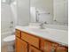 Bright bathroom features a vanity with a single sink and a shower/tub combination at 170 Heywatchis Dr, Mooresville, NC 28115