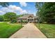 Charming community clubhouse at Linwood Farms with well-maintained landscaping and inviting entrance at 170 Heywatchis Dr, Mooresville, NC 28115