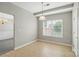 A bright dining area features a large window and modern light fixture at 170 Heywatchis Dr, Mooresville, NC 28115