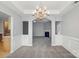 Living room featuring carpet flooring, decorative molding, and a fireplace at 170 Heywatchis Dr, Mooresville, NC 28115