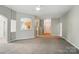 Open-concept living area leading to the foyer and kitchen at 170 Heywatchis Dr, Mooresville, NC 28115