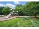 Community playground at Linwood Farms with swings, slides, and picnic tables for Gathering fun at 170 Heywatchis Dr, Mooresville, NC 28115