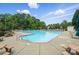 Community pool at Linwood Farms with ample seating, shade, and pristine blue water at 170 Heywatchis Dr, Mooresville, NC 28115
