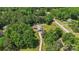Aerial view shows the house, driveway, surrounding trees, and neighborhood at 1753 Elmwood Dr, Rock Hill, SC 29730