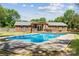 Backyard features sparkling in-ground pool and lush green landscaping at 1753 Elmwood Dr, Rock Hill, SC 29730