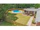 Aerial view of a private backyard oasis with a fenced pool and wooden pergola at 1753 Elmwood Dr, Rock Hill, SC 29730