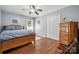 Bedroom with wood floors, bed, dresser, and a window, which gives the space natural light at 1753 Elmwood Dr, Rock Hill, SC 29730