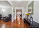 Warm, inviting entryway featuring hardwood floors, soft gray walls, and stylish decor at 1753 Elmwood Dr, Rock Hill, SC 29730