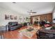 Inviting living room with exposed brick wall and comfortable leather furnishings at 1753 Elmwood Dr, Rock Hill, SC 29730