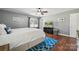 Cozy main bedroom with hardwood floors, and a ceiling fan providing a relaxing retreat at 1753 Elmwood Dr, Rock Hill, SC 29730