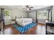 Serene main bedroom featuring hardwood floors, neutral paint and a geometric patterned accent wall at 1753 Elmwood Dr, Rock Hill, SC 29730