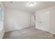 Bright bedroom with neutral walls, carpet, and a window for natural light at 1835 Allegheny Dr, Gastonia, NC 28054