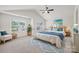 Serene main bedroom with neutral tones, ceiling fan, and large windows at 1835 Allegheny Dr, Gastonia, NC 28054