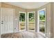 Bright dining area with big windows and backyard view at 2002 Kingston Rd, Kingstown, NC 28150