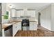 The kitchen features modern stainless appliances, wood countertops and a window view at 2002 Kingston Rd, Kingstown, NC 28150