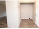 A utility room features vinyl flooring, white walls, a storage cabinet, and easy access to utilities at 2002 Kingston Rd, Kingstown, NC 28150