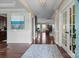 Elegant foyer featuring dark hardwood floors, wainscoting, and a stylish rug at 2007 Bishops Ct, Cornelius, NC 28031
