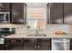 Close up of a kitchen area with stainless steel appliances and granite countertops at 2007 Bishops Ct, Cornelius, NC 28031