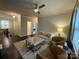Inviting living room with hardwood floors, comfortable seating, and plenty of natural light at 2007 Bishops Ct, Cornelius, NC 28031
