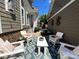 Cozy patio area with comfortable seating, string lights, and stylish decor at 2007 Bishops Ct, Cornelius, NC 28031